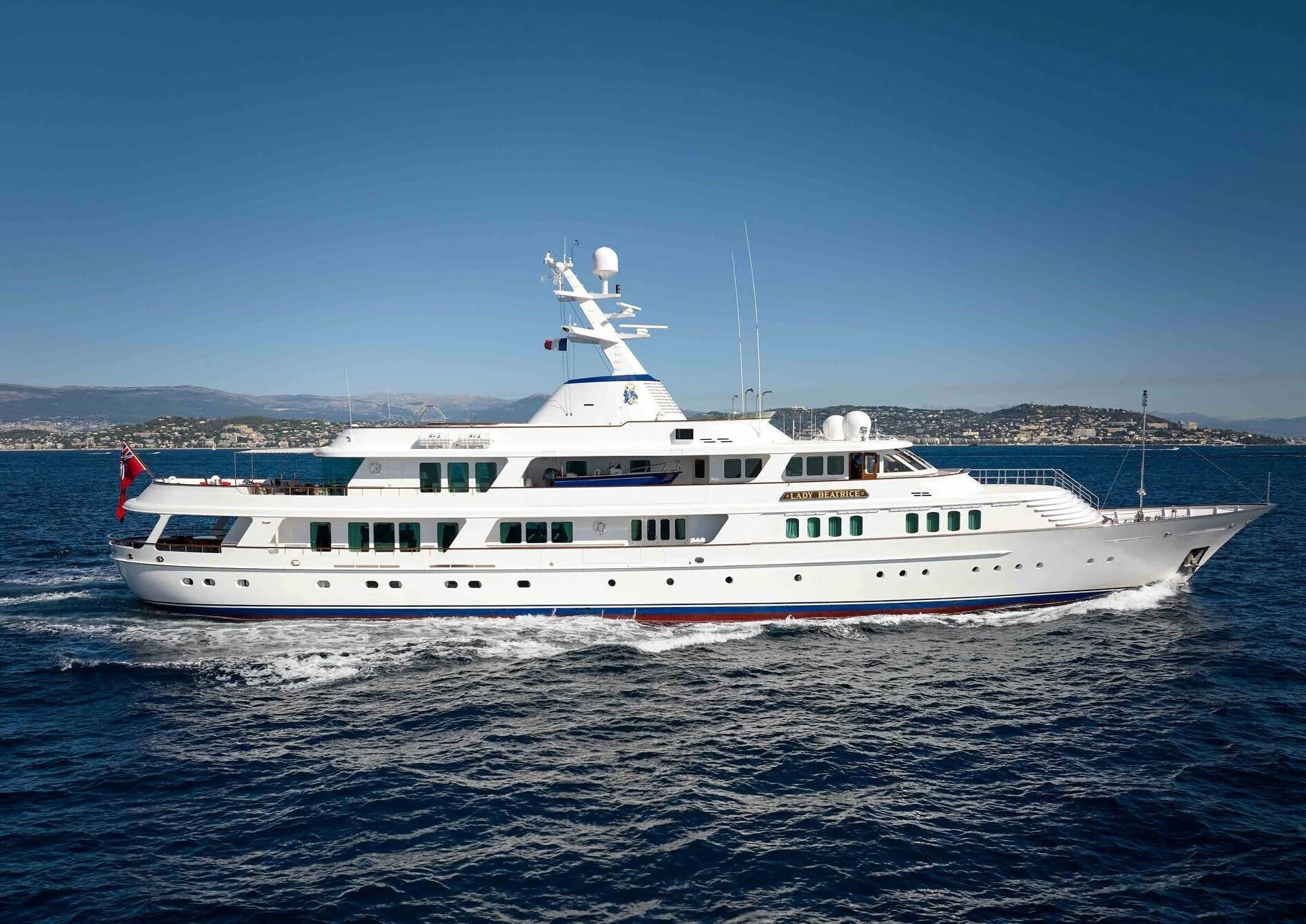 a large white boat in the water aboard LADY BEATRICE Yacht for Sale