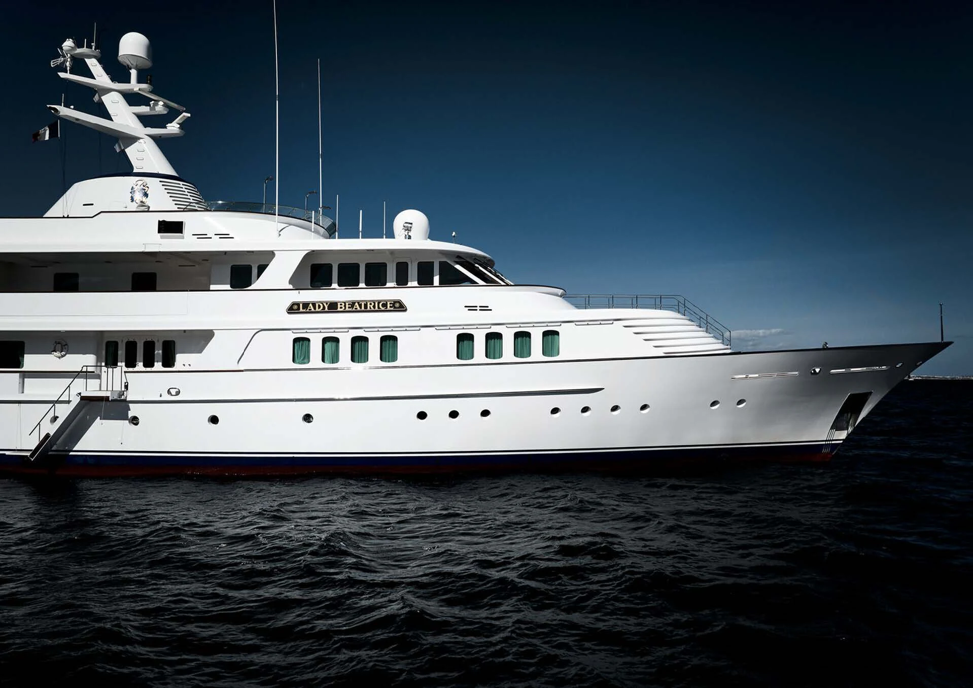 a large white boat in the water aboard LADY BEATRICE Yacht for Sale