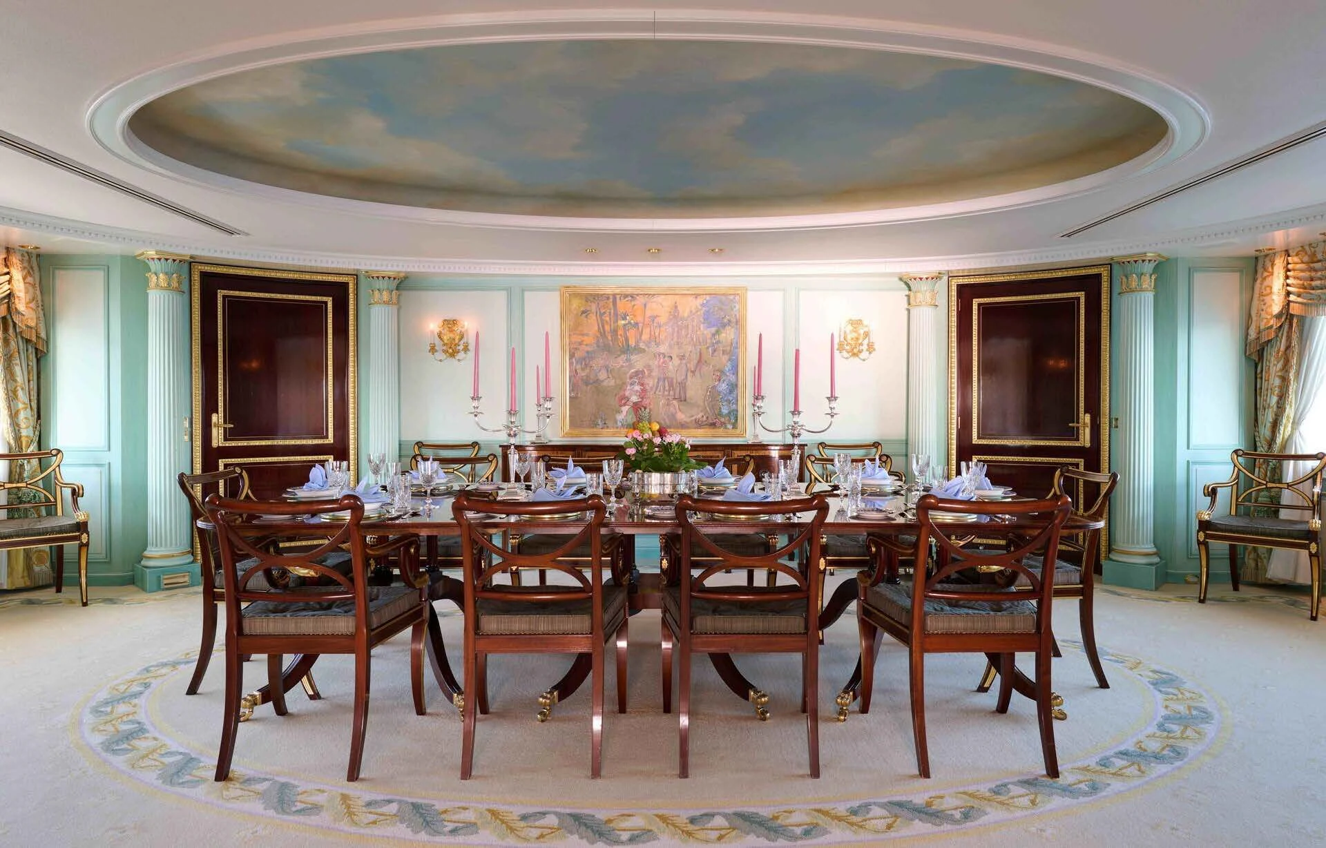 a dining room with a table and chairs aboard LADY BEATRICE Yacht for Sale