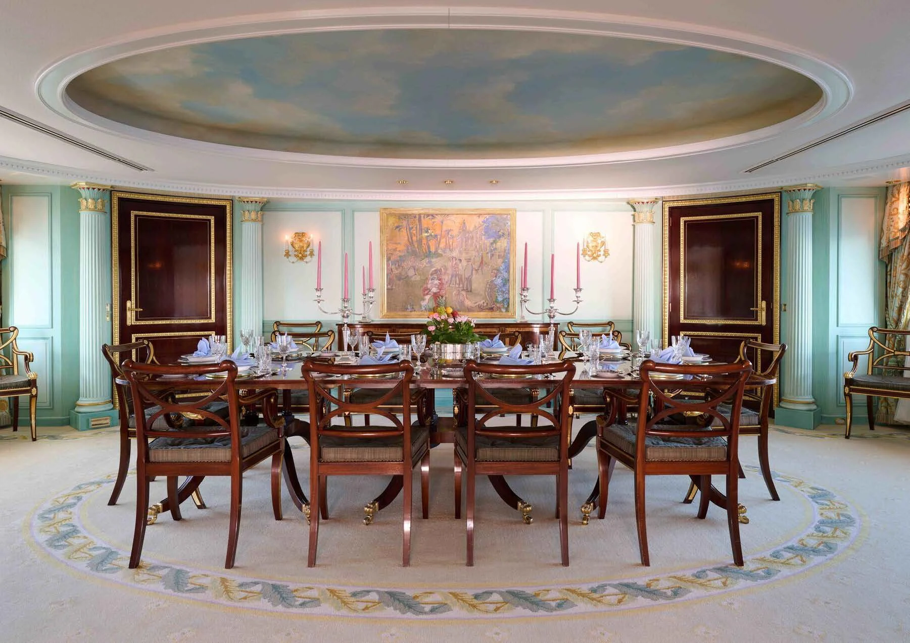 a dining room with a table and chairs aboard LADY BEATRICE Yacht for Sale