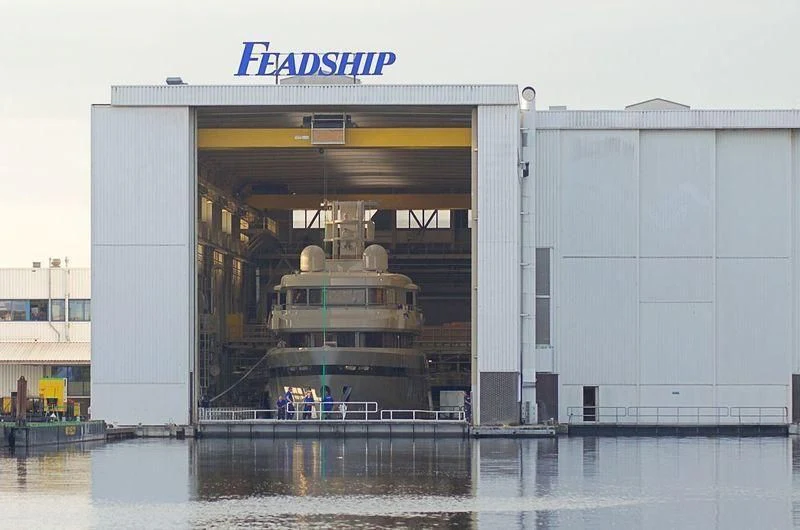 a large building with a large boat aboard PROMISE Yacht for Sale