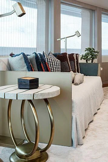 a bed with a white bed spread aboard PROMISE Yacht for Sale