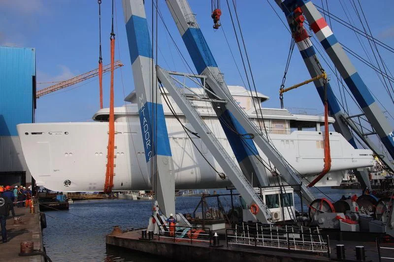 a large white boat docked aboard PROMISE Yacht for Sale