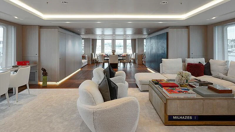 a living room with a couch and a coffee table aboard PROMISE Yacht for Sale