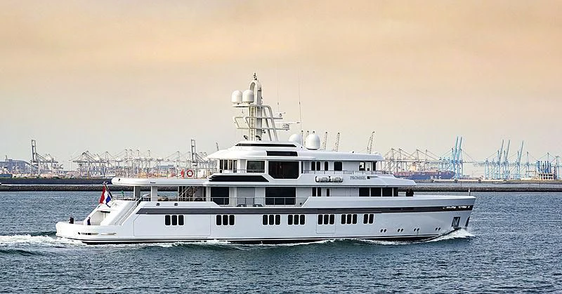 a large white boat in the water aboard PROMISE Yacht for Sale