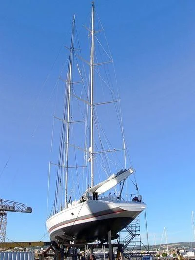 a boat docked at a pier aboard MARI-CHA III Yacht for Sale