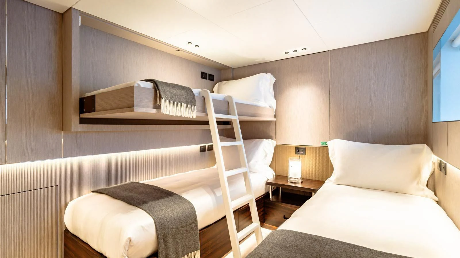 a room with two beds aboard WAVE Yacht for Sale