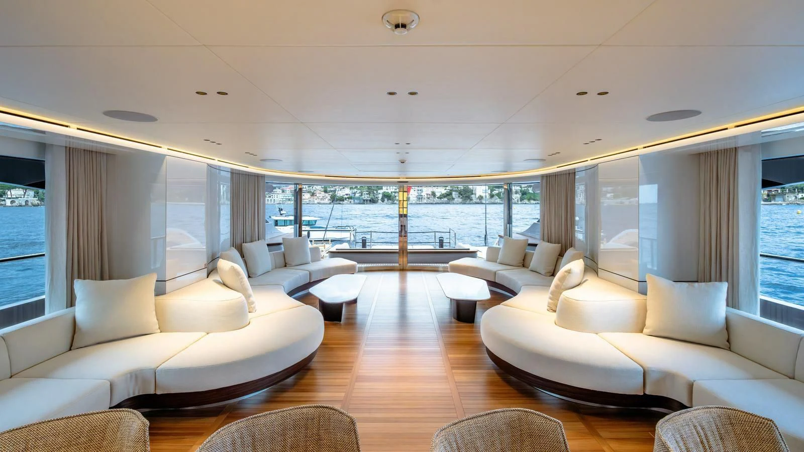 a living room with a large window aboard WAVE Yacht for Sale