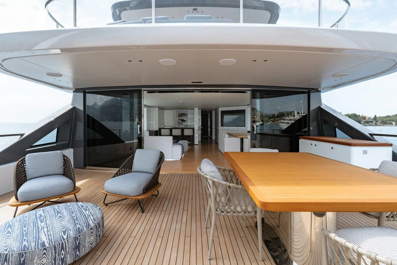 a room with a table chairs and a large window aboard WAVE Yacht for Sale