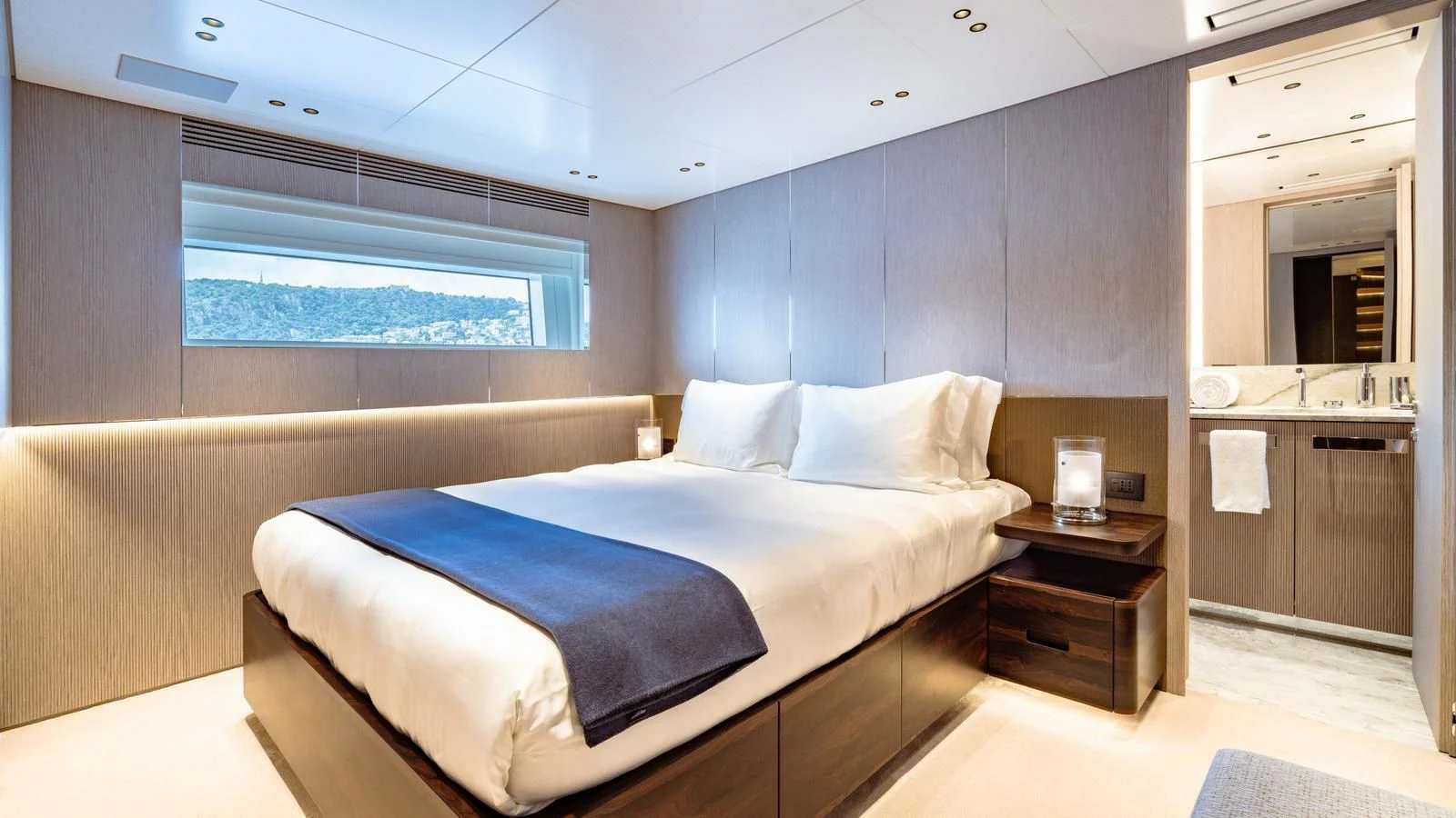 a bed in a room aboard WAVE Yacht for Sale