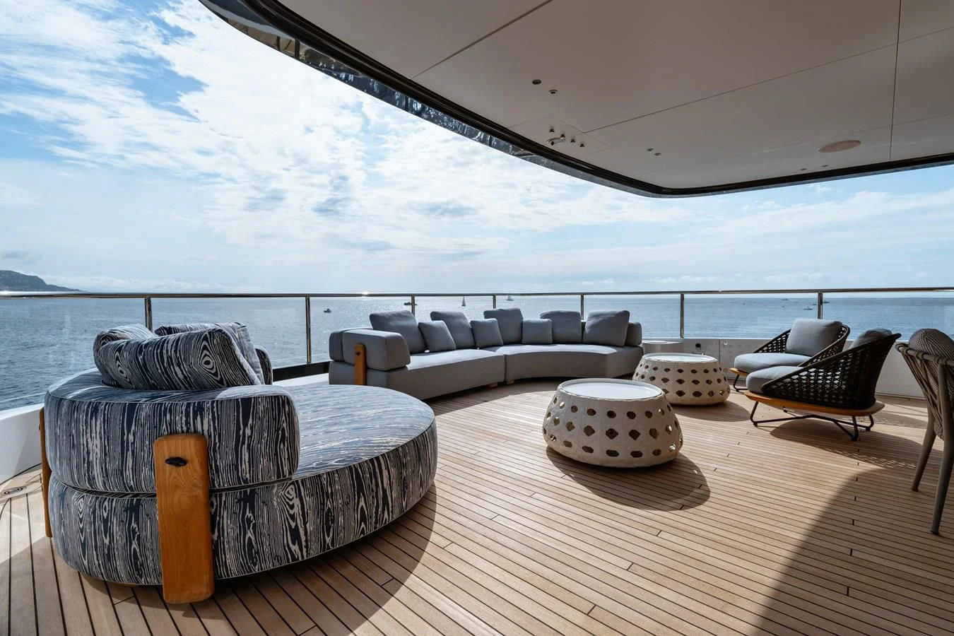 a large living room with a large balcony aboard WAVE Yacht for Sale