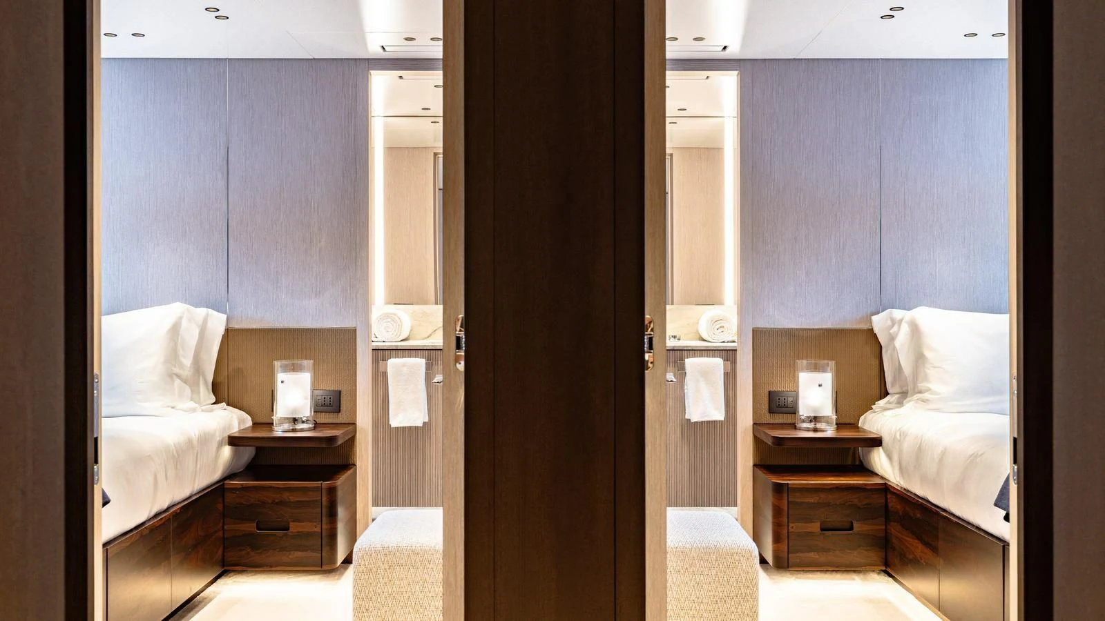 a room with a bed and a closet aboard WAVE Yacht for Sale