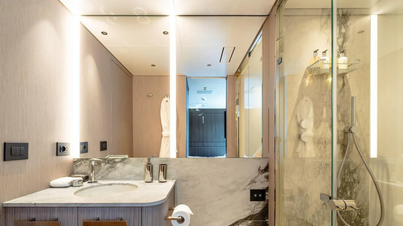 a bathroom with a sink and a mirror aboard WAVE Yacht for Sale