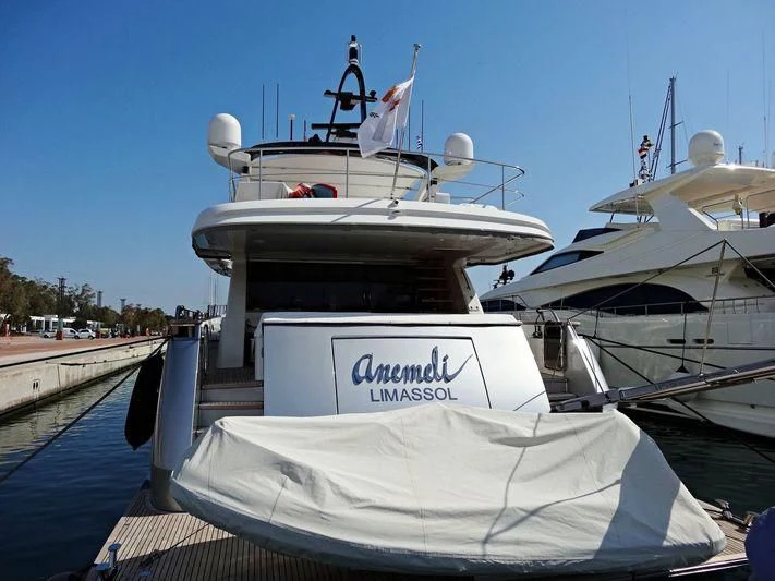 a boat docked at a pier aboard ANEMELI Yacht for Sale