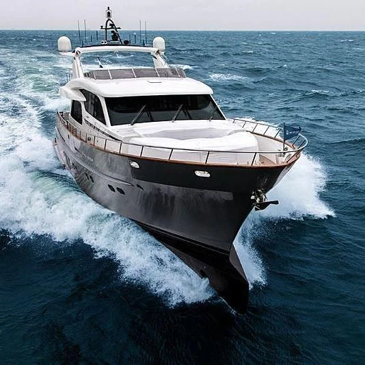 a white boat on the water aboard ANEMELI Yacht for Sale