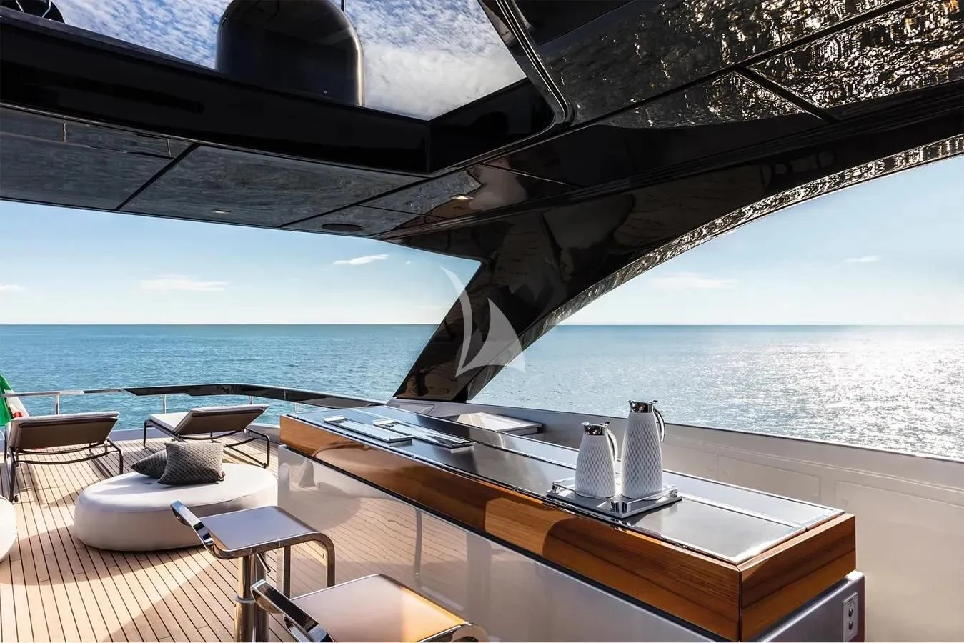 a patio with a table and chairs aboard MEMORIES Yacht for Sale