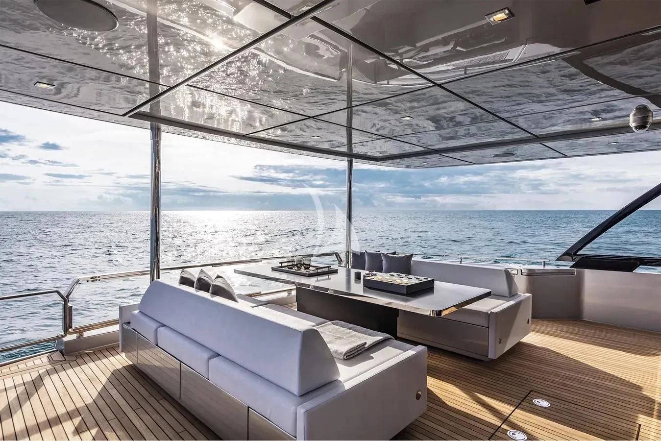 a room with a bed and a large window overlooking the ocean aboard MEMORIES Yacht for Sale