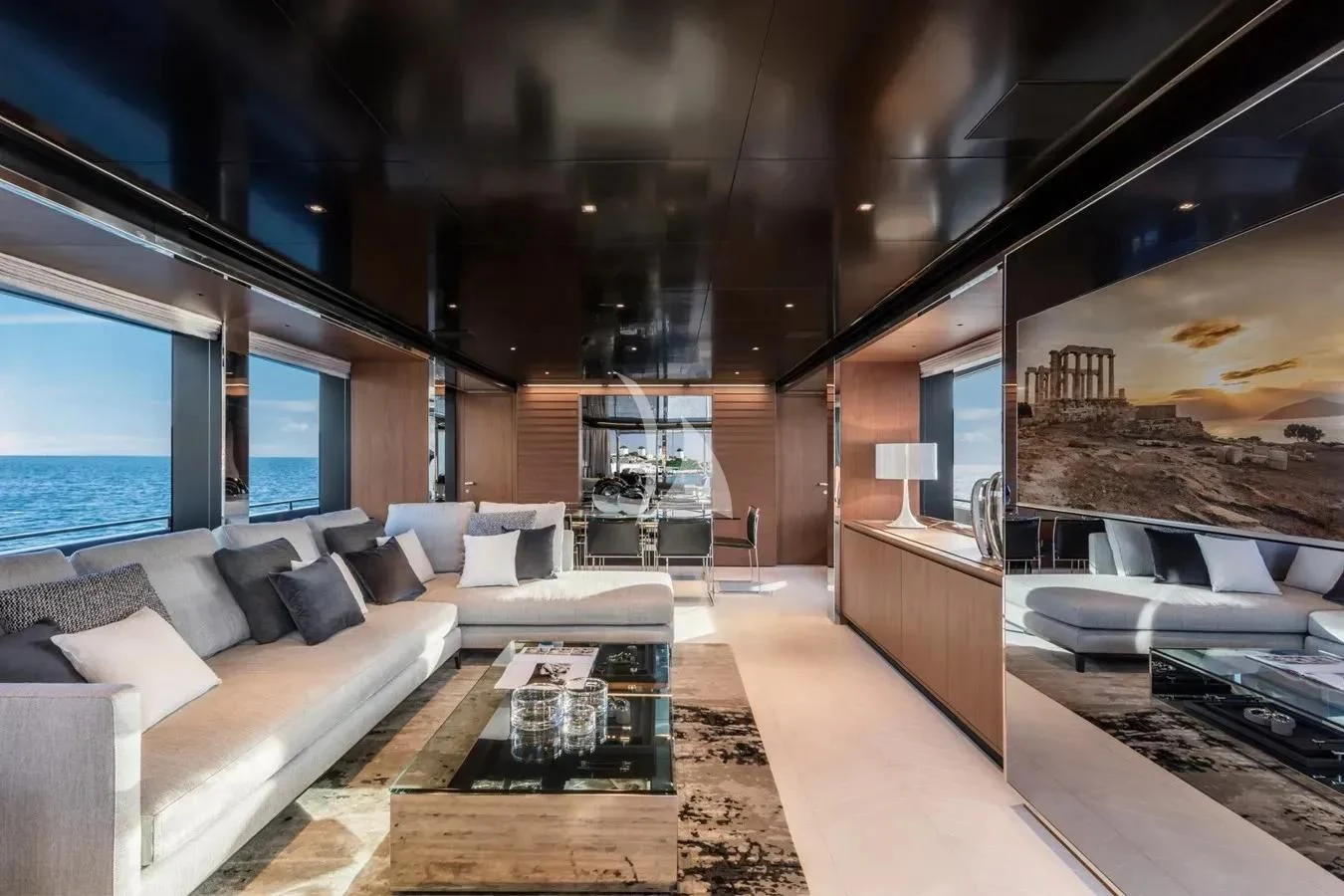 a living room with a large fireplace aboard MEMORIES Yacht for Sale