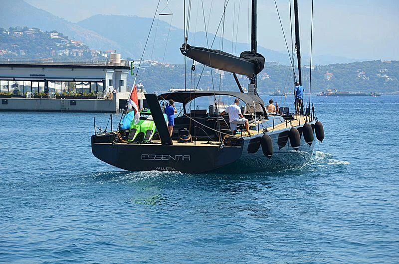 a boat sailing on the water aboard ESSENTIA Yacht for Sale