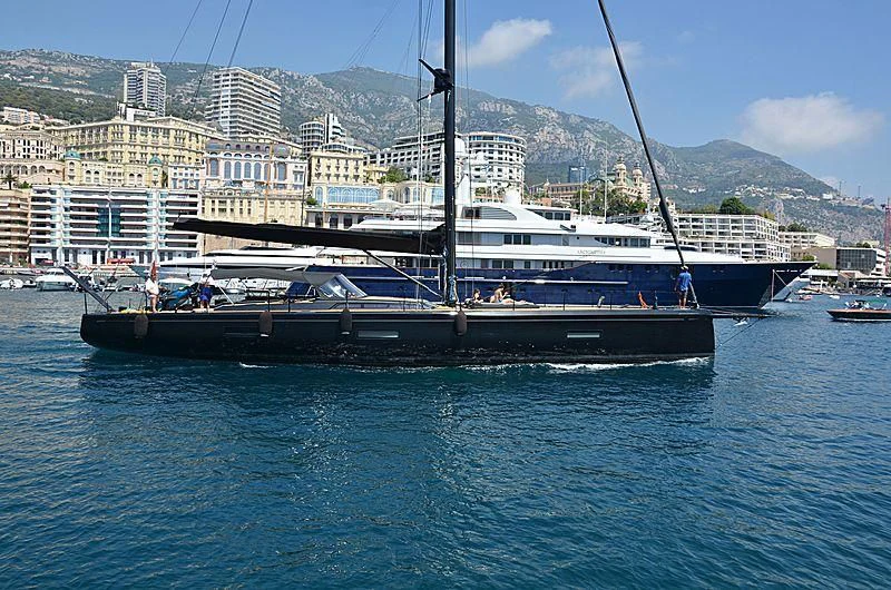 a large boat in the water aboard ESSENTIA Yacht for Sale