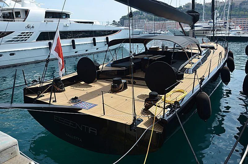 a boat docked at a pier aboard ESSENTIA Yacht for Sale