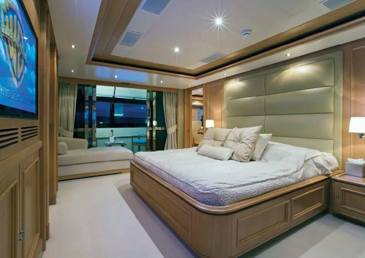 a hotel room with a bed aboard HANA Yacht for Charter