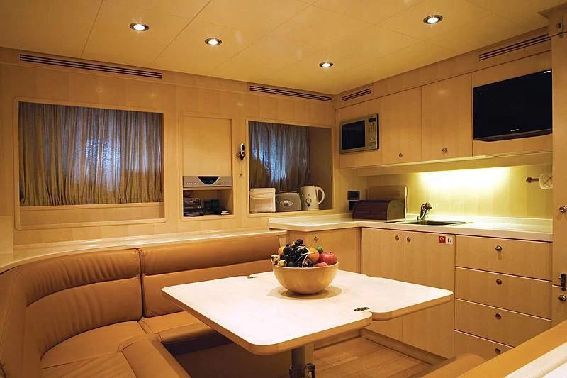 a modern looking kitchen aboard HANA Yacht for Charter