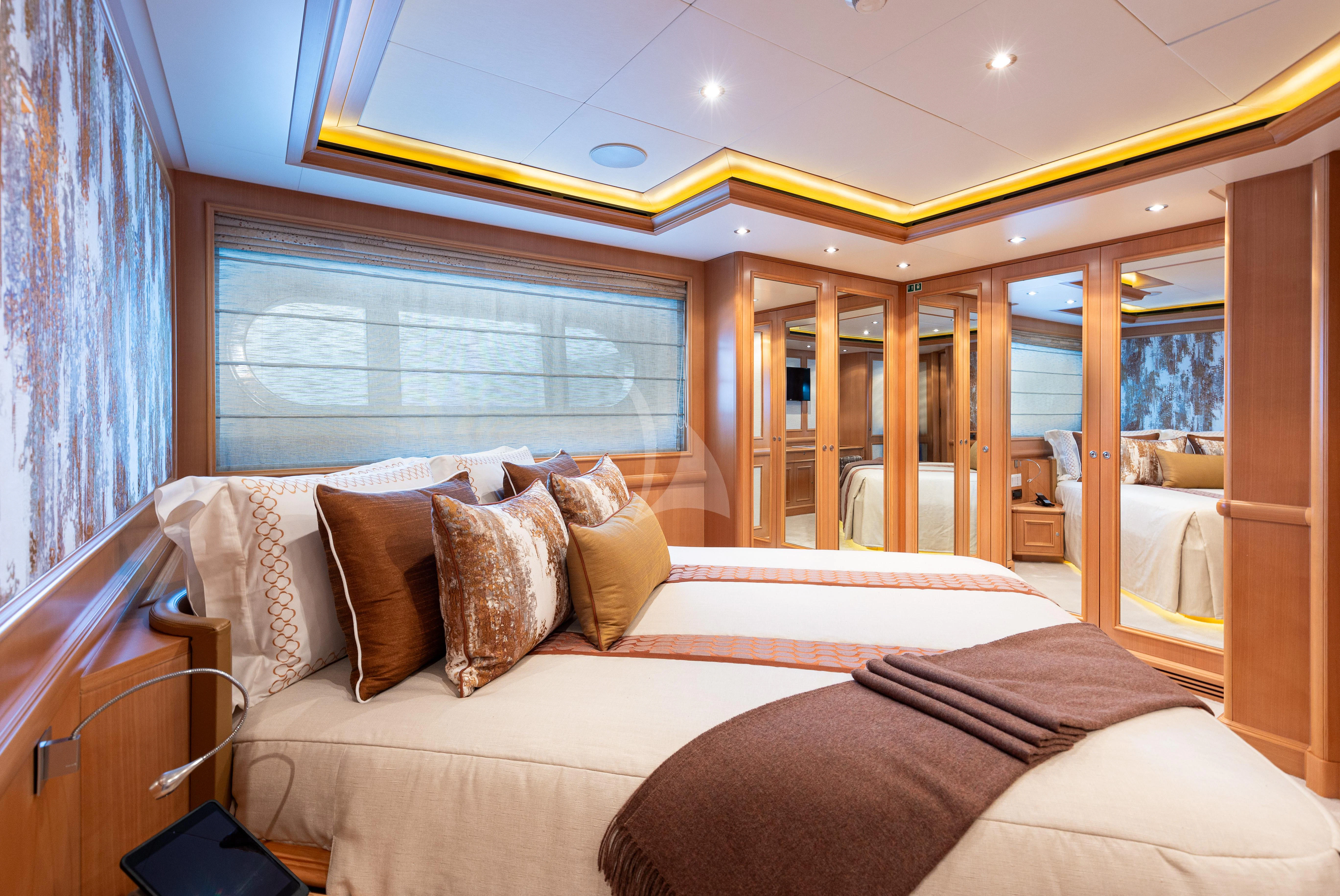 a bed in a room aboard HANA Yacht for Charter