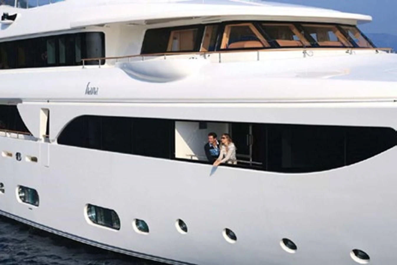 two people sitting on a yacht aboard HANA Yacht for Charter