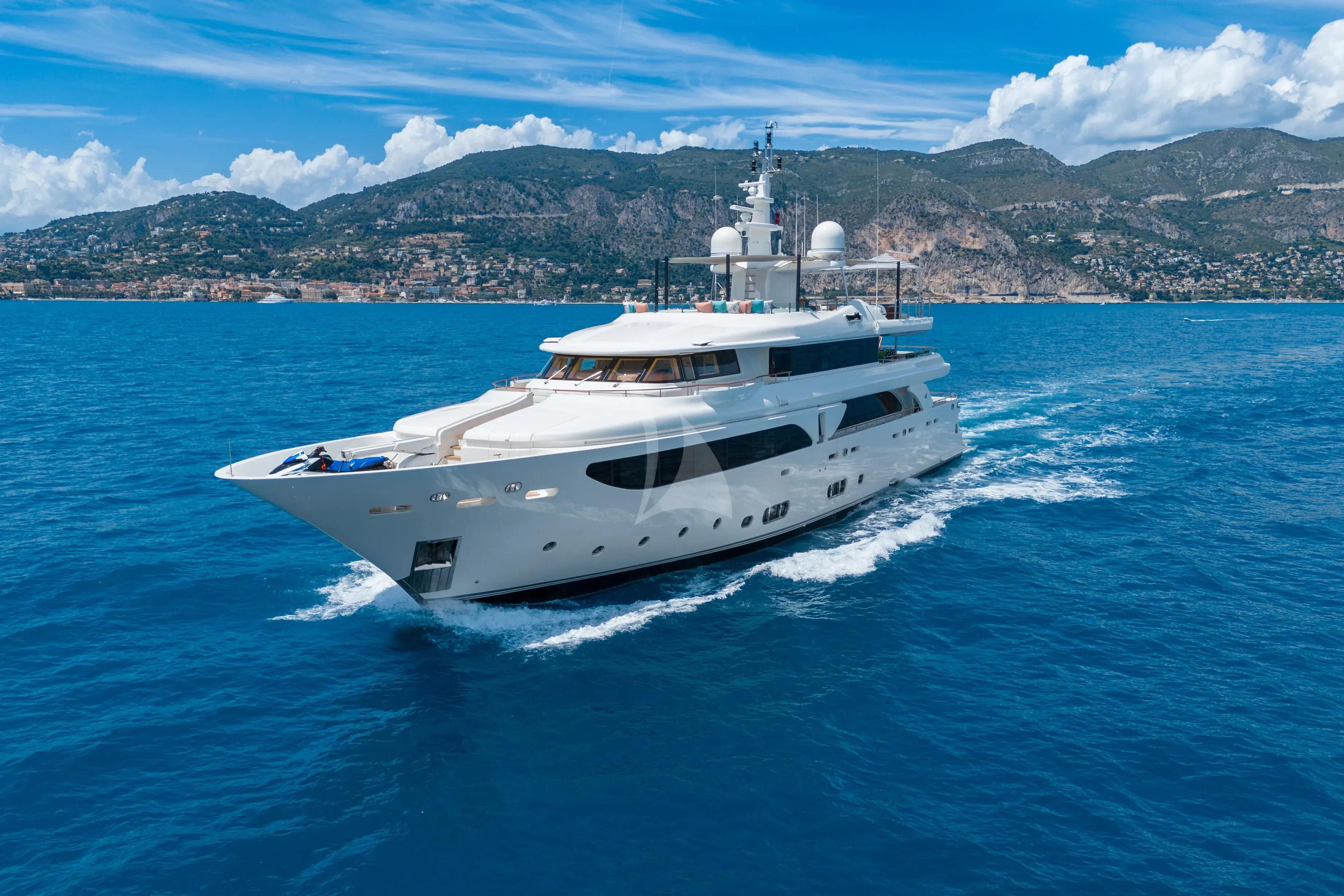 a white yacht on the water aboard HANA Yacht for Charter