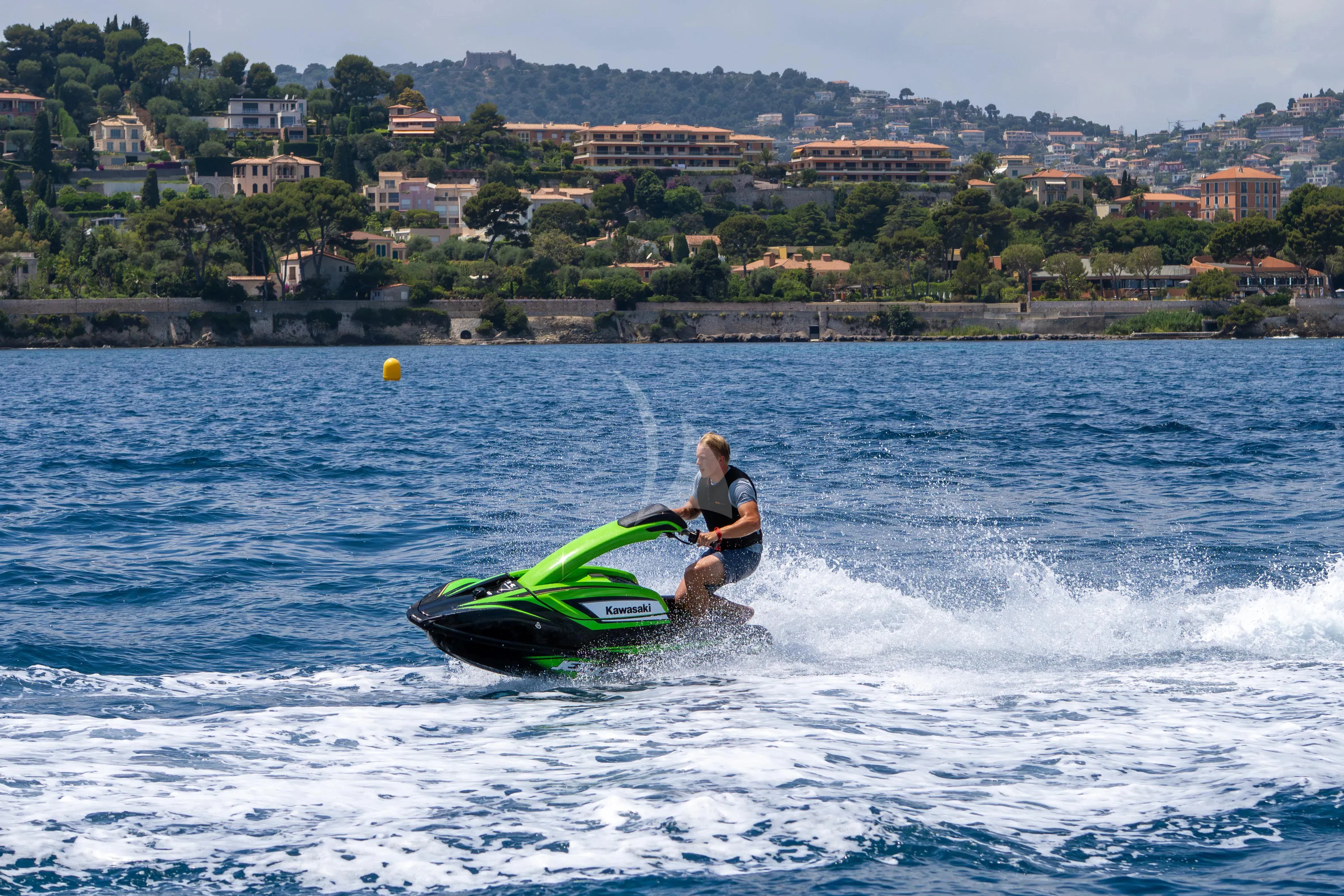 a person on a jet ski aboard HANA Yacht for Charter