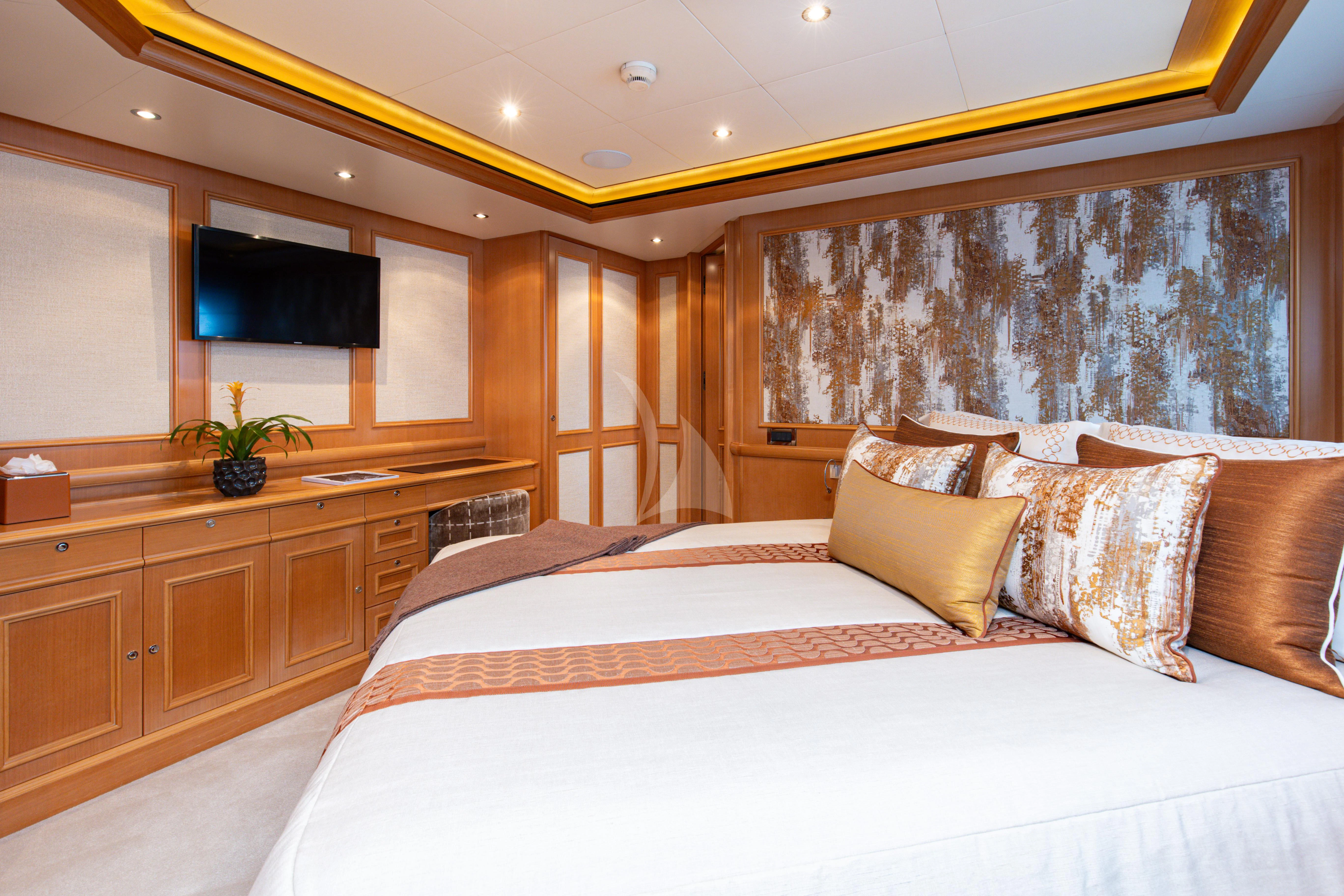 a large bed in a room aboard HANA Yacht for Charter