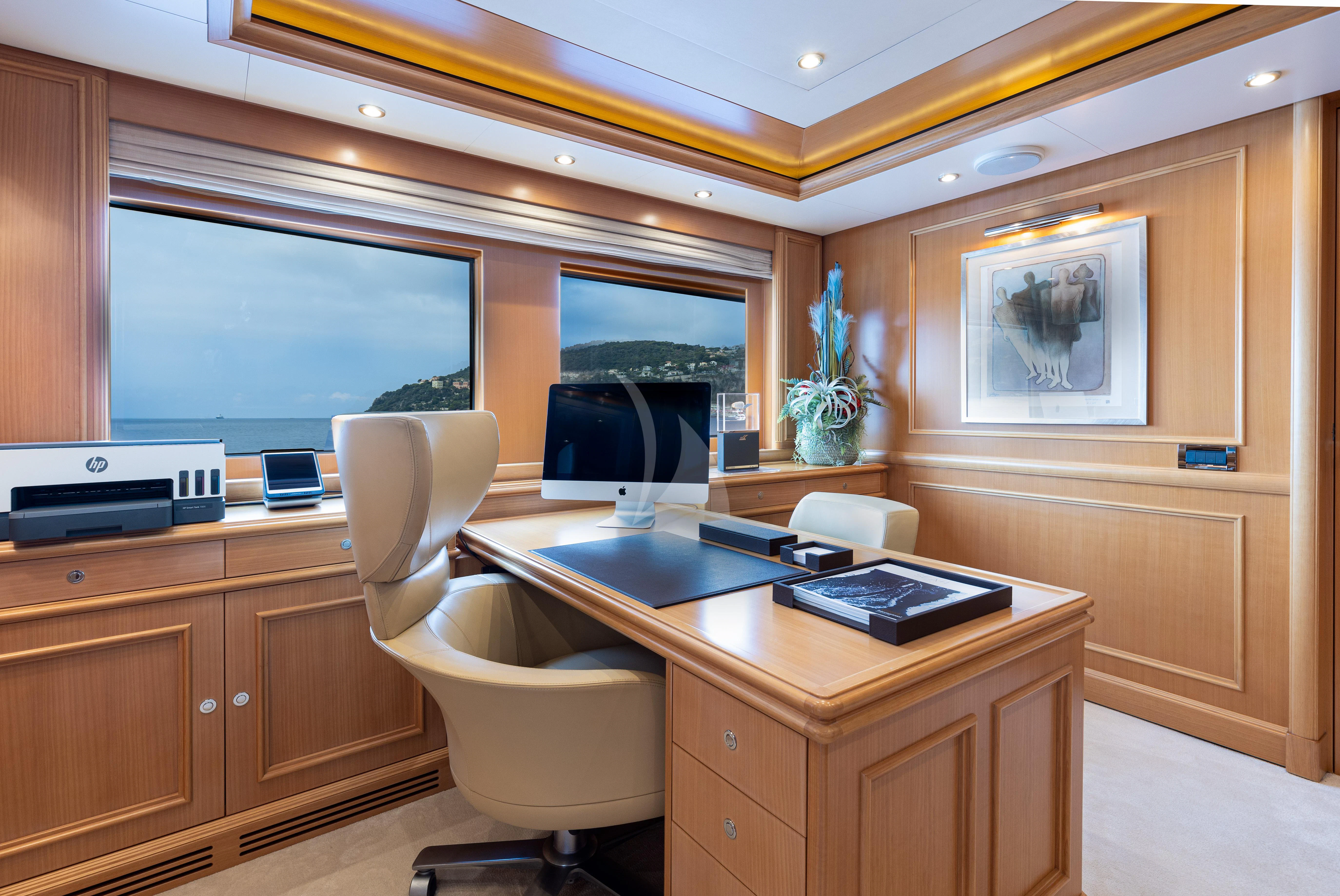 a kitchen with a large window aboard HANA Yacht for Charter