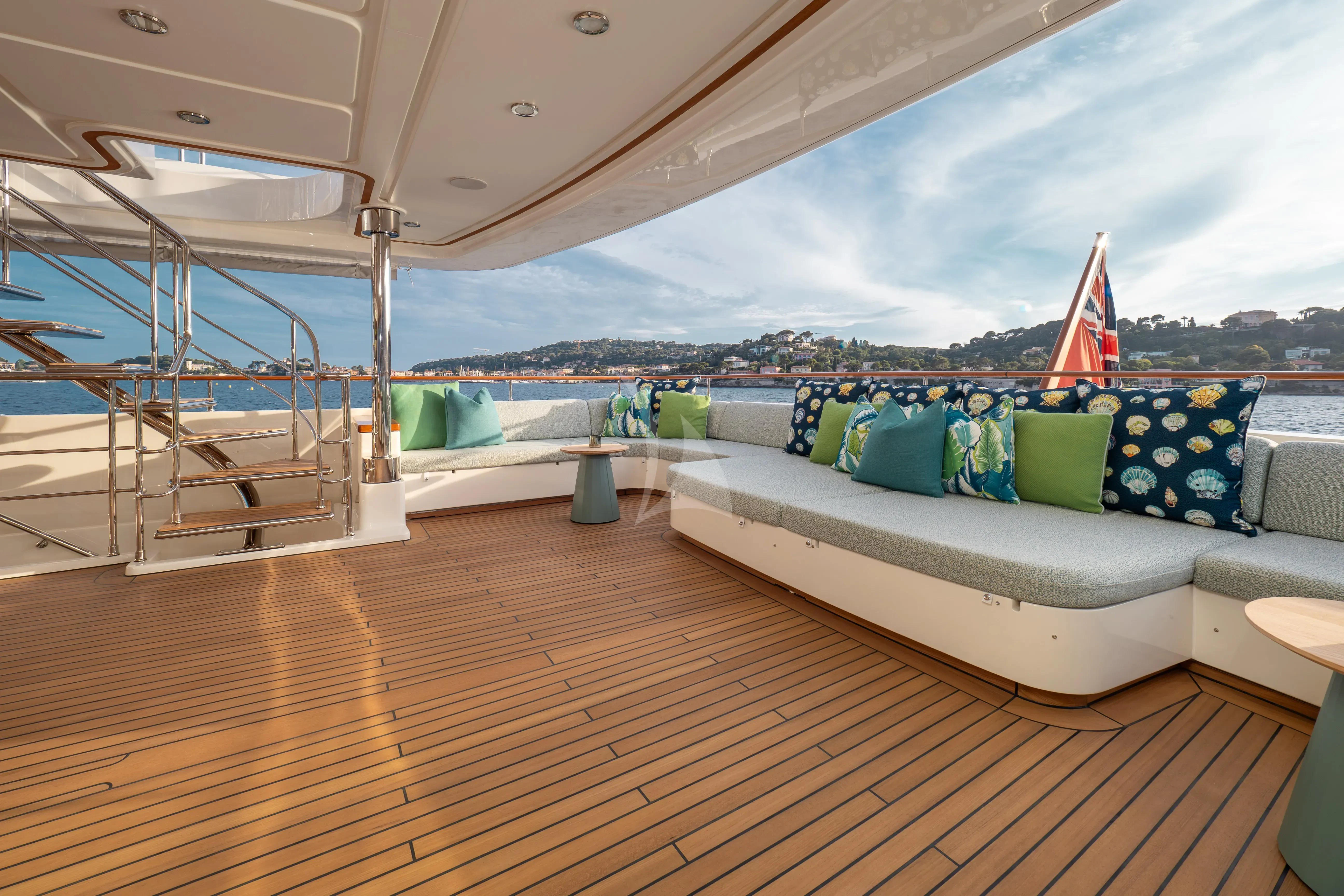 a boat on a deck aboard HANA Yacht for Charter