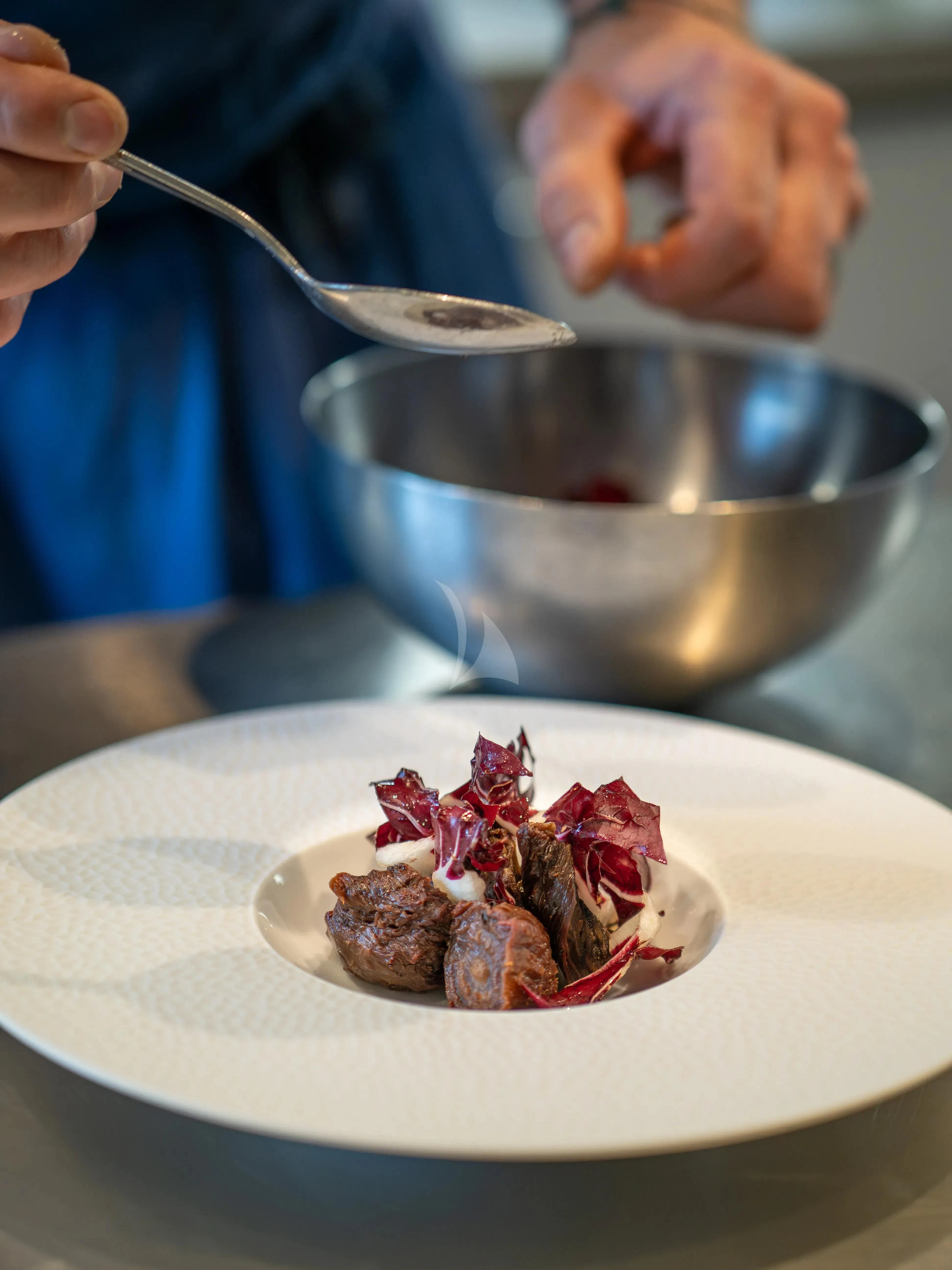 a person eating food aboard HANA Yacht for Charter