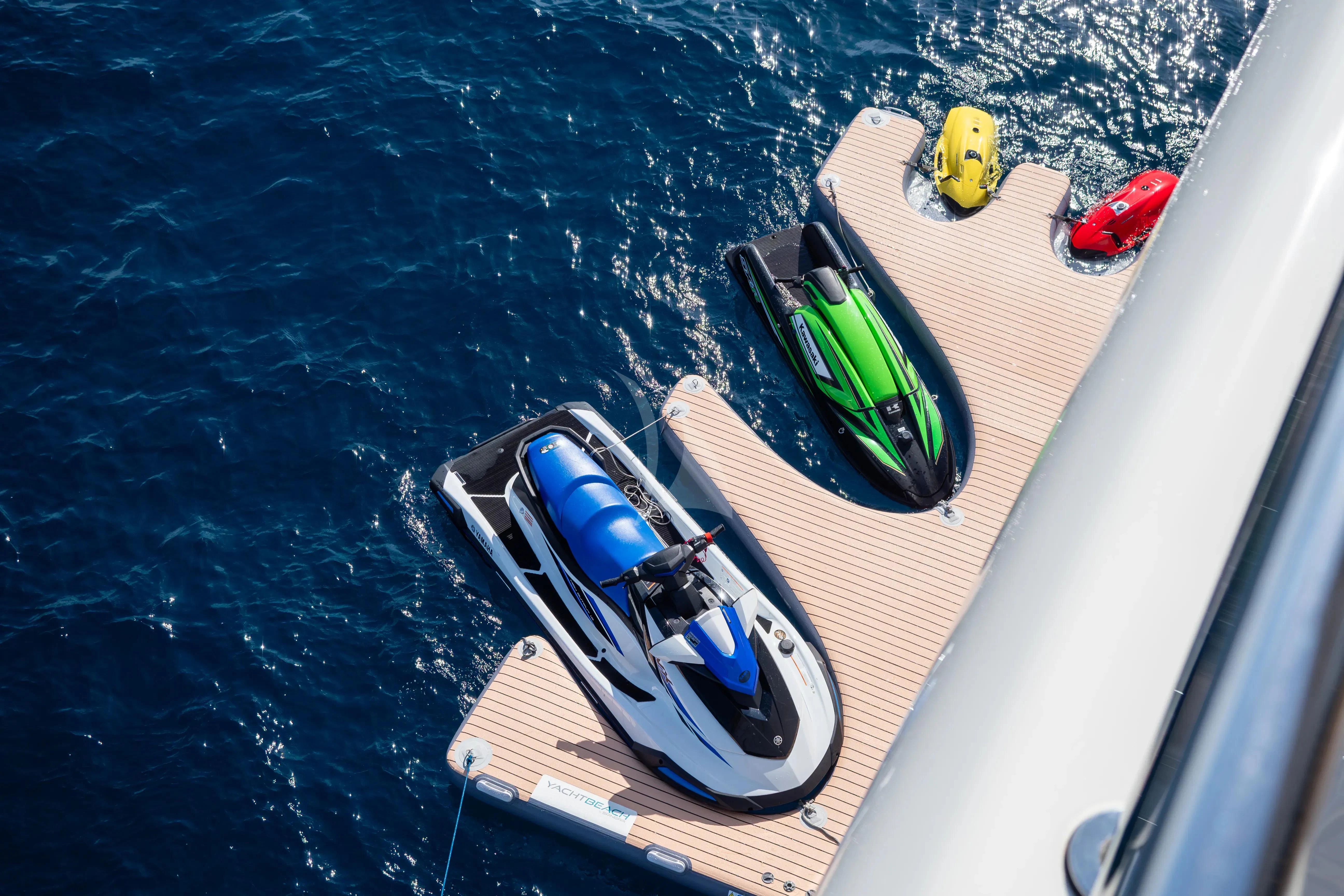 a boat with a green and red seagull on it aboard HANA Yacht for Charter