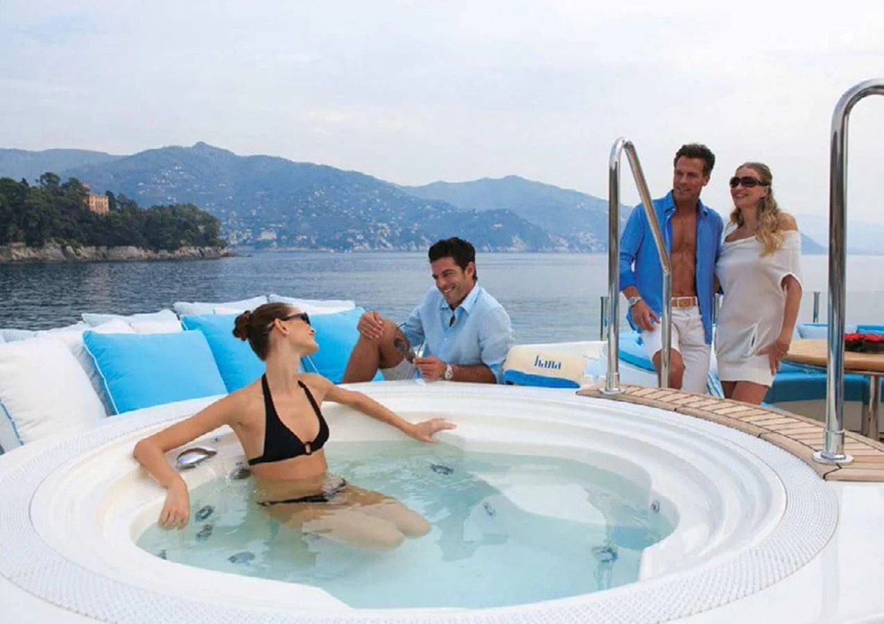 a person lying on a boat aboard HANA Yacht for Charter