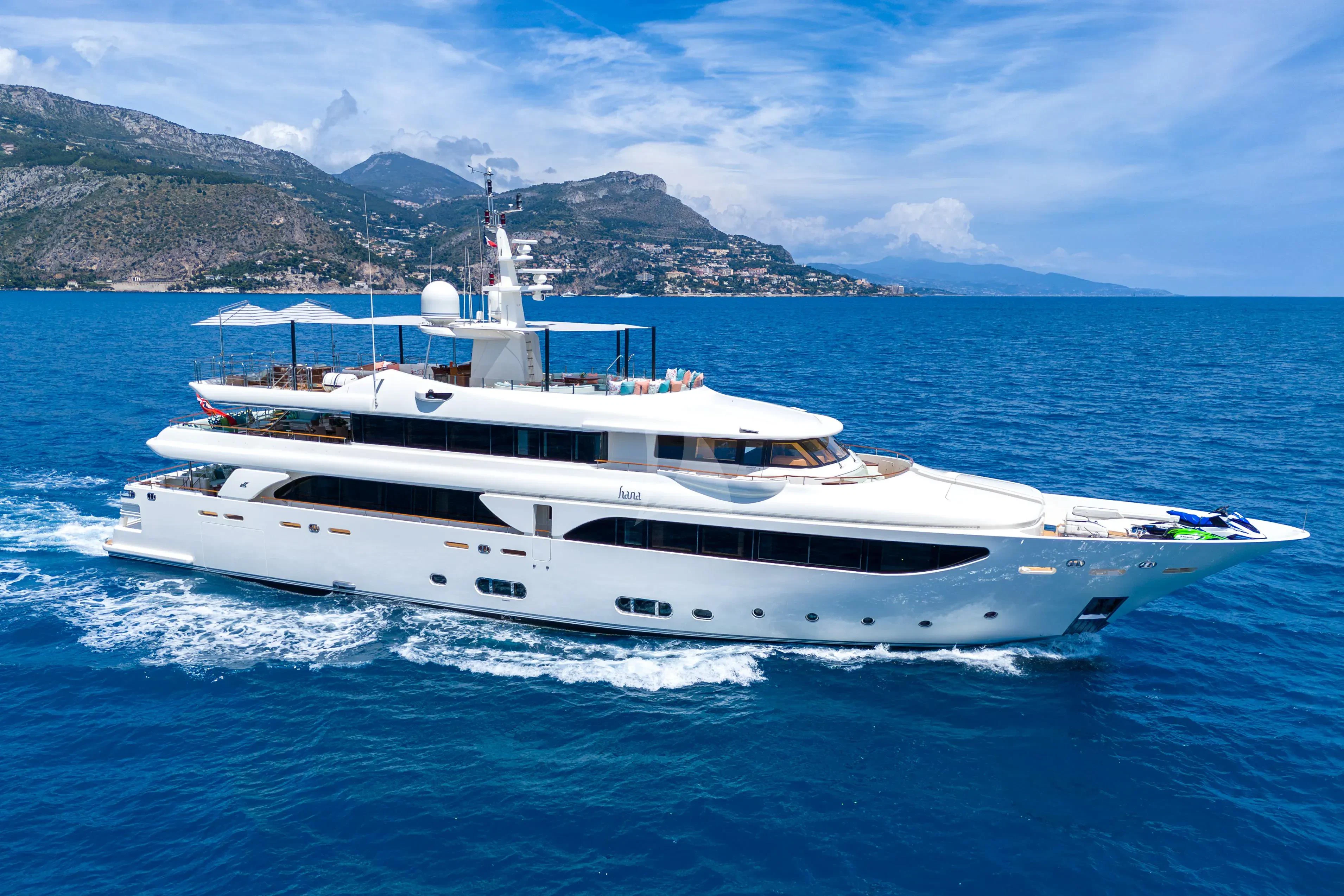 a white yacht on the water aboard HANA Yacht for Charter