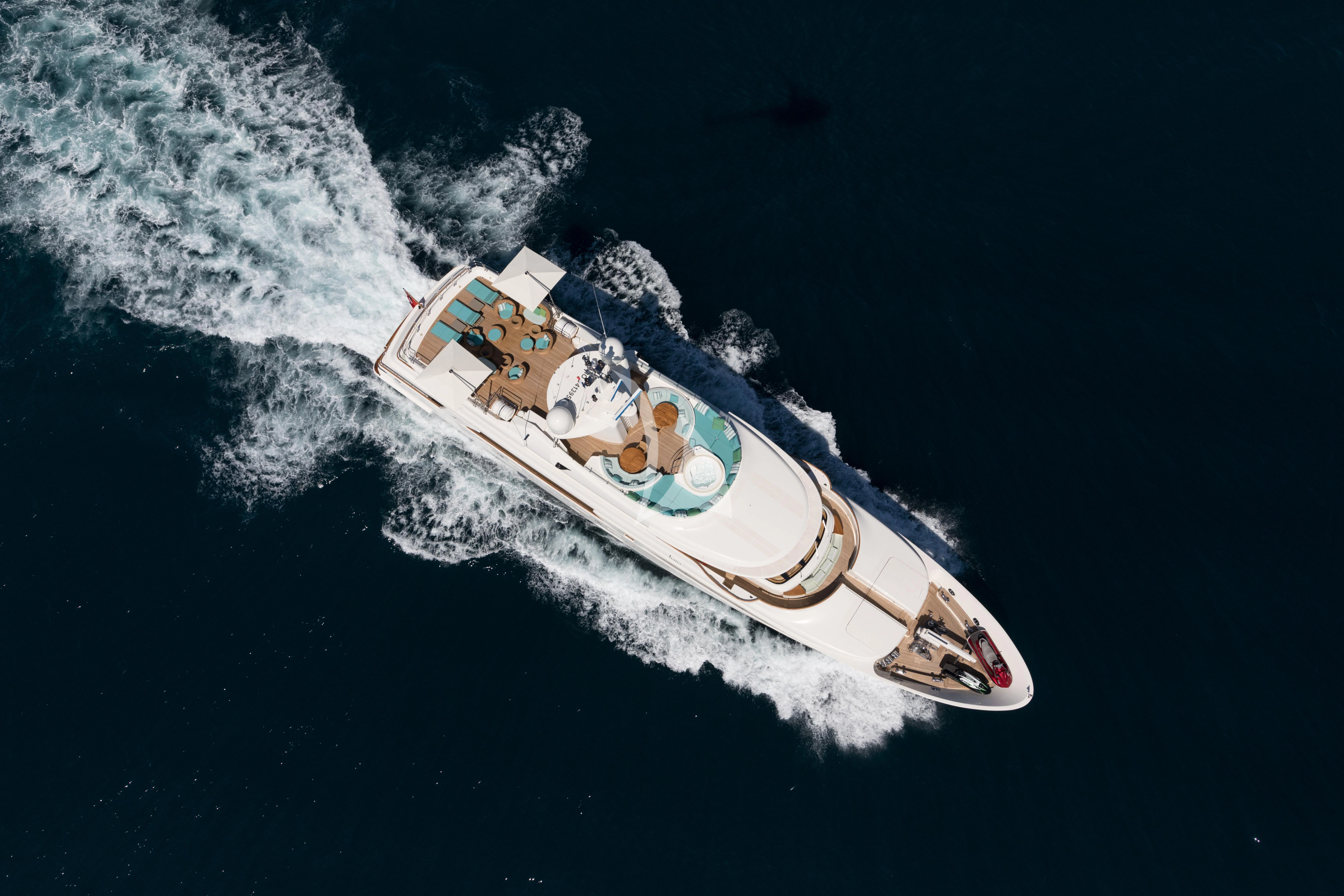 a white boat on water aboard HANA Yacht for Charter