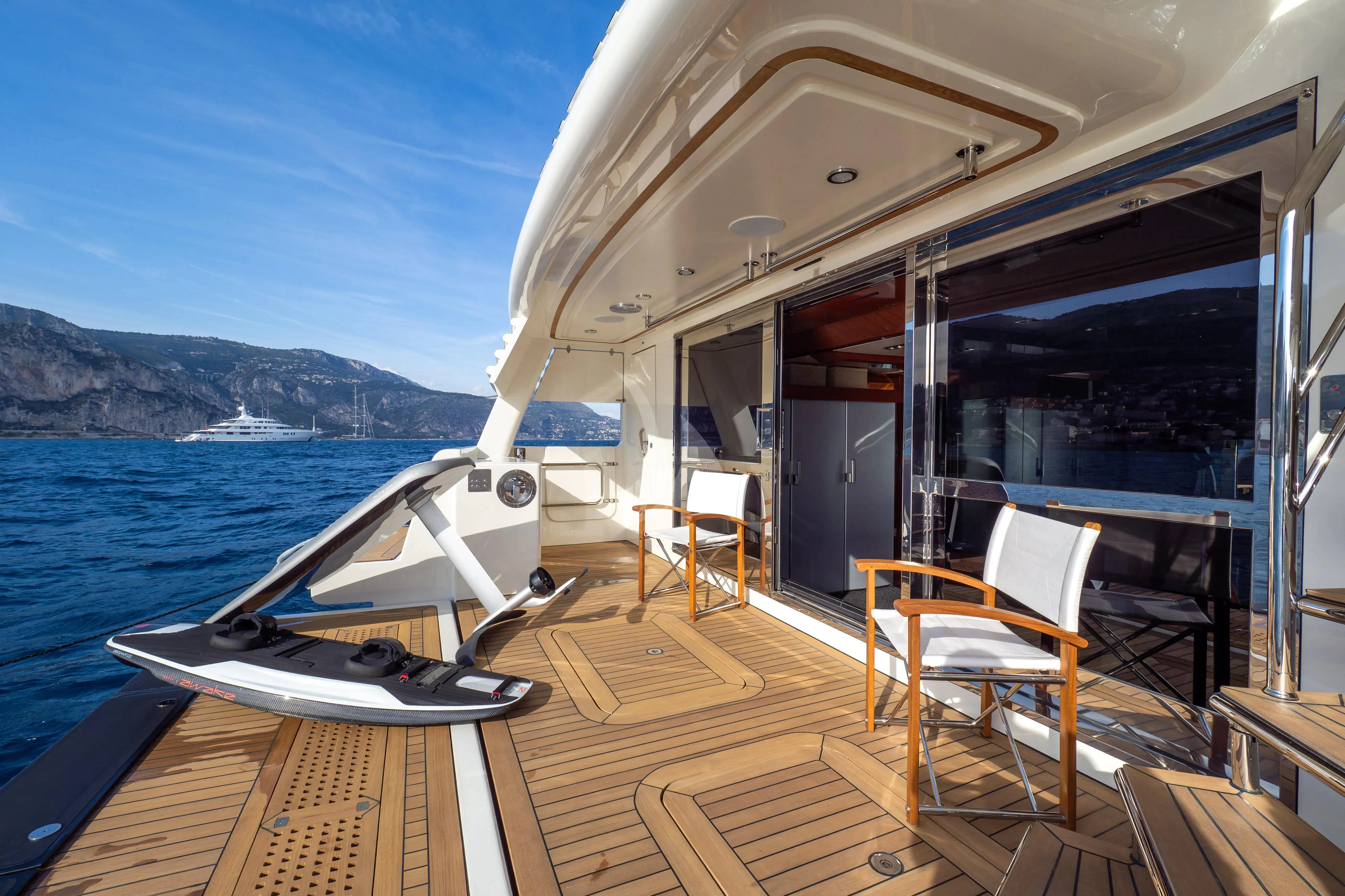 a boat on a deck aboard HANA Yacht for Charter