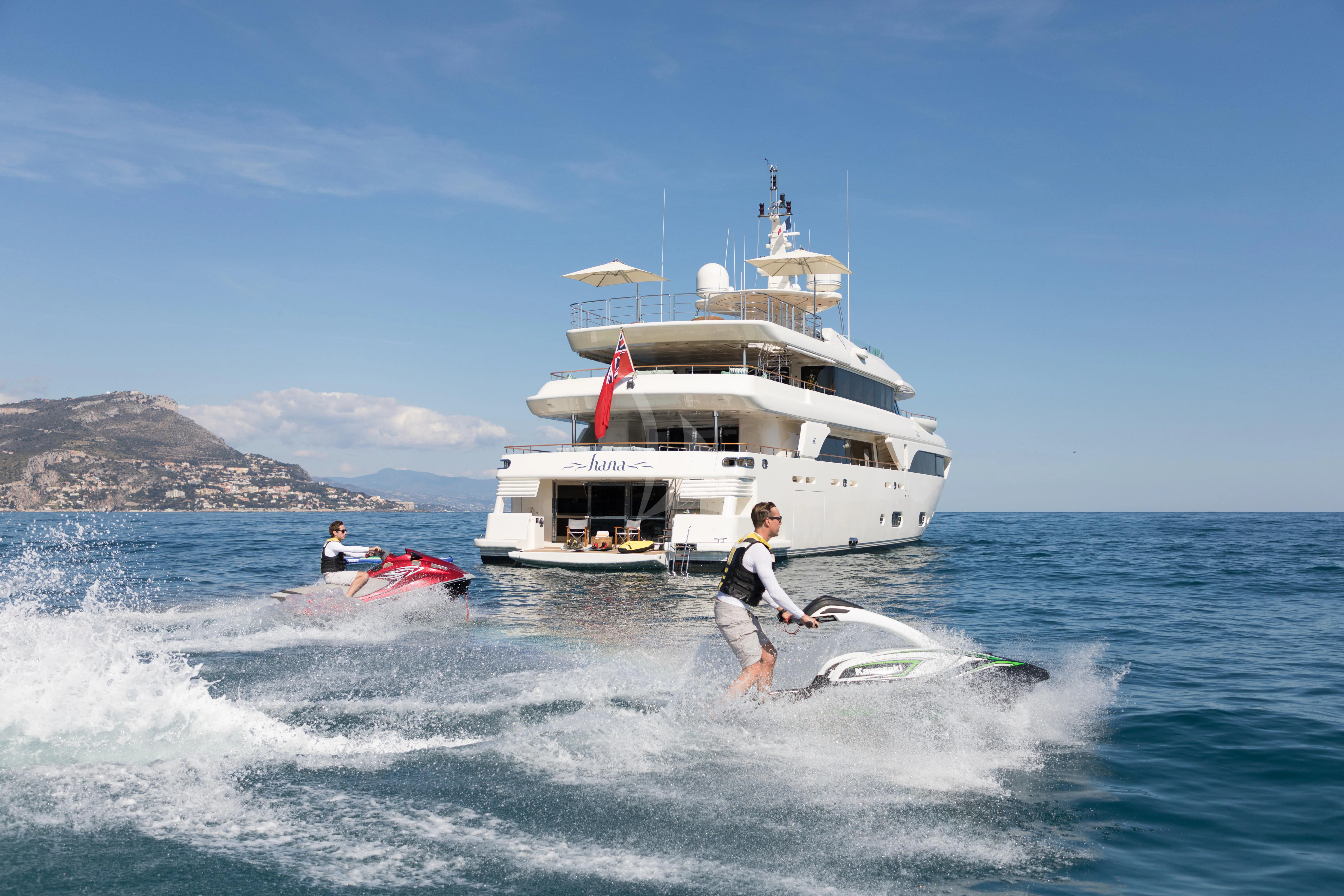 a man on a jet ski aboard HANA Yacht for Charter