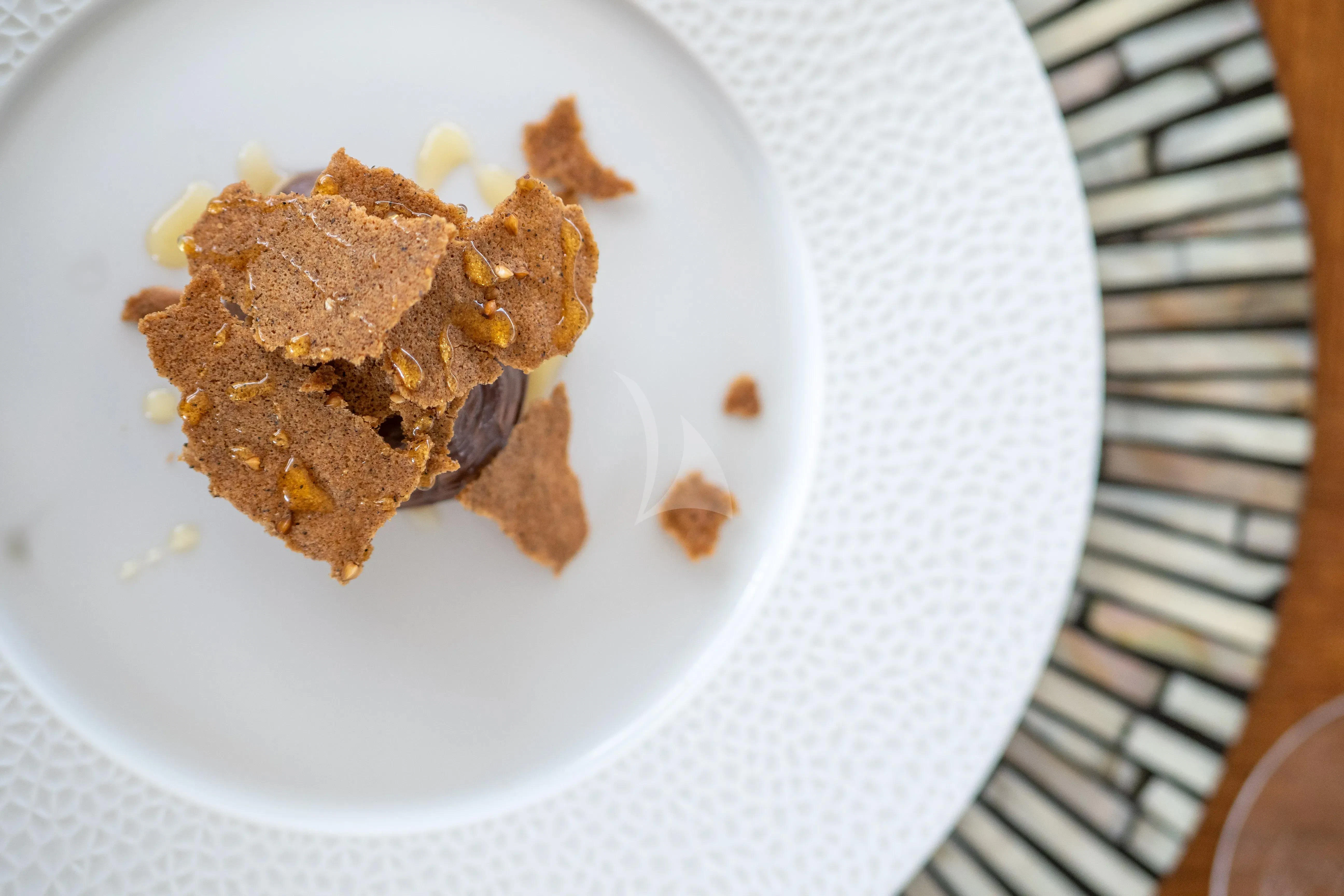 a plate of food aboard HANA Yacht for Charter