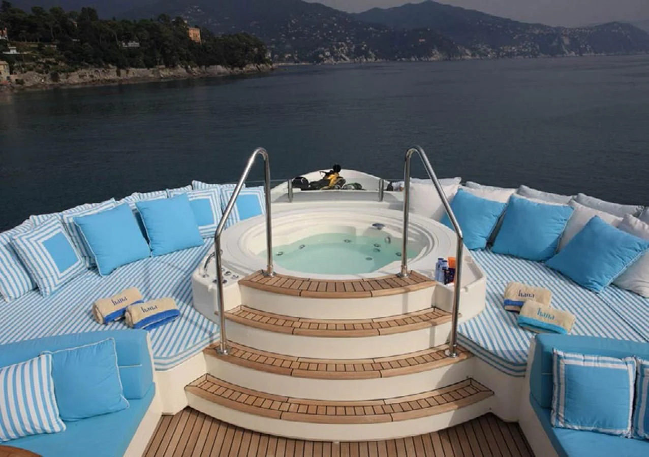 a boat on a deck aboard HANA Yacht for Charter