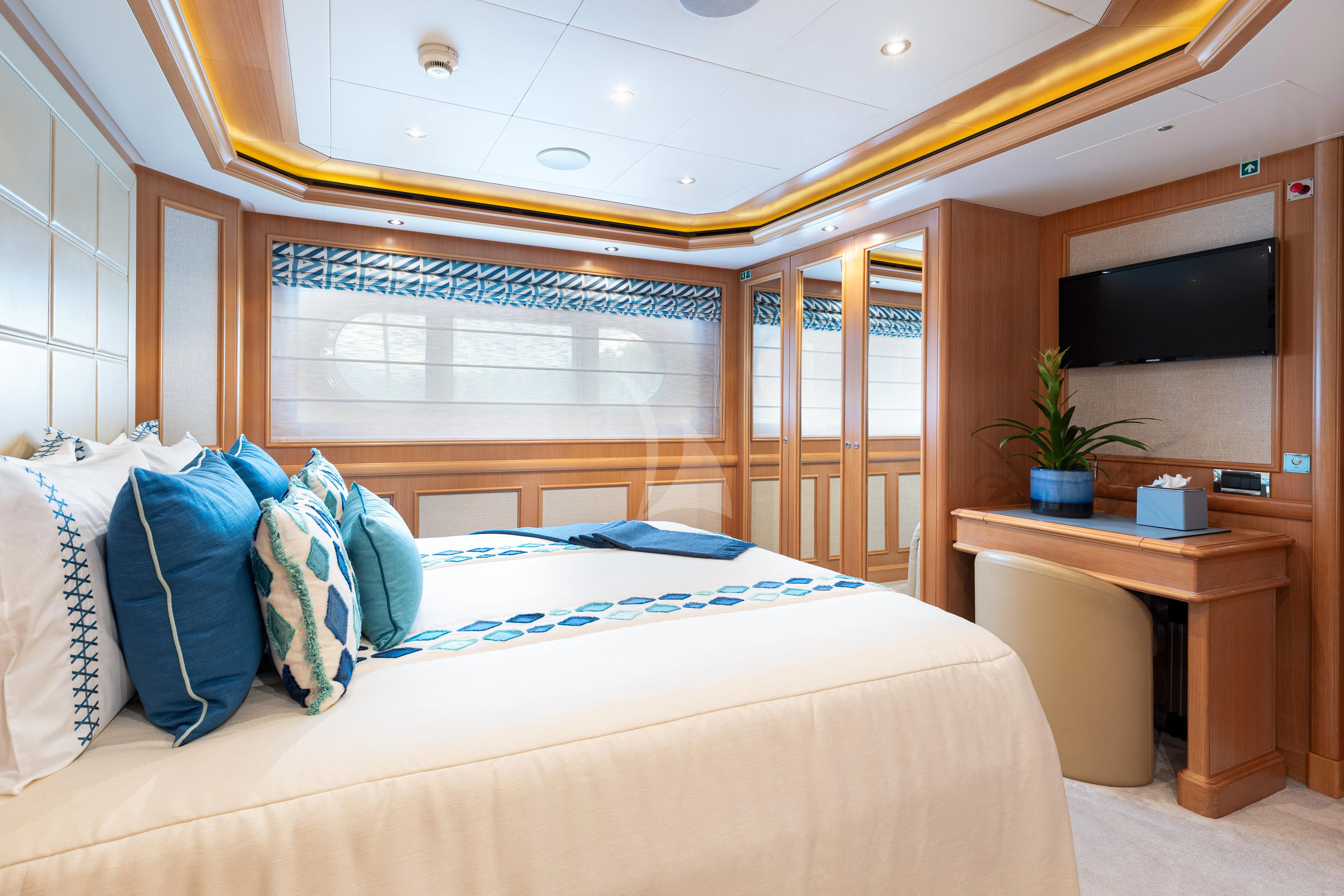 a bed in a room aboard HANA Yacht for Charter