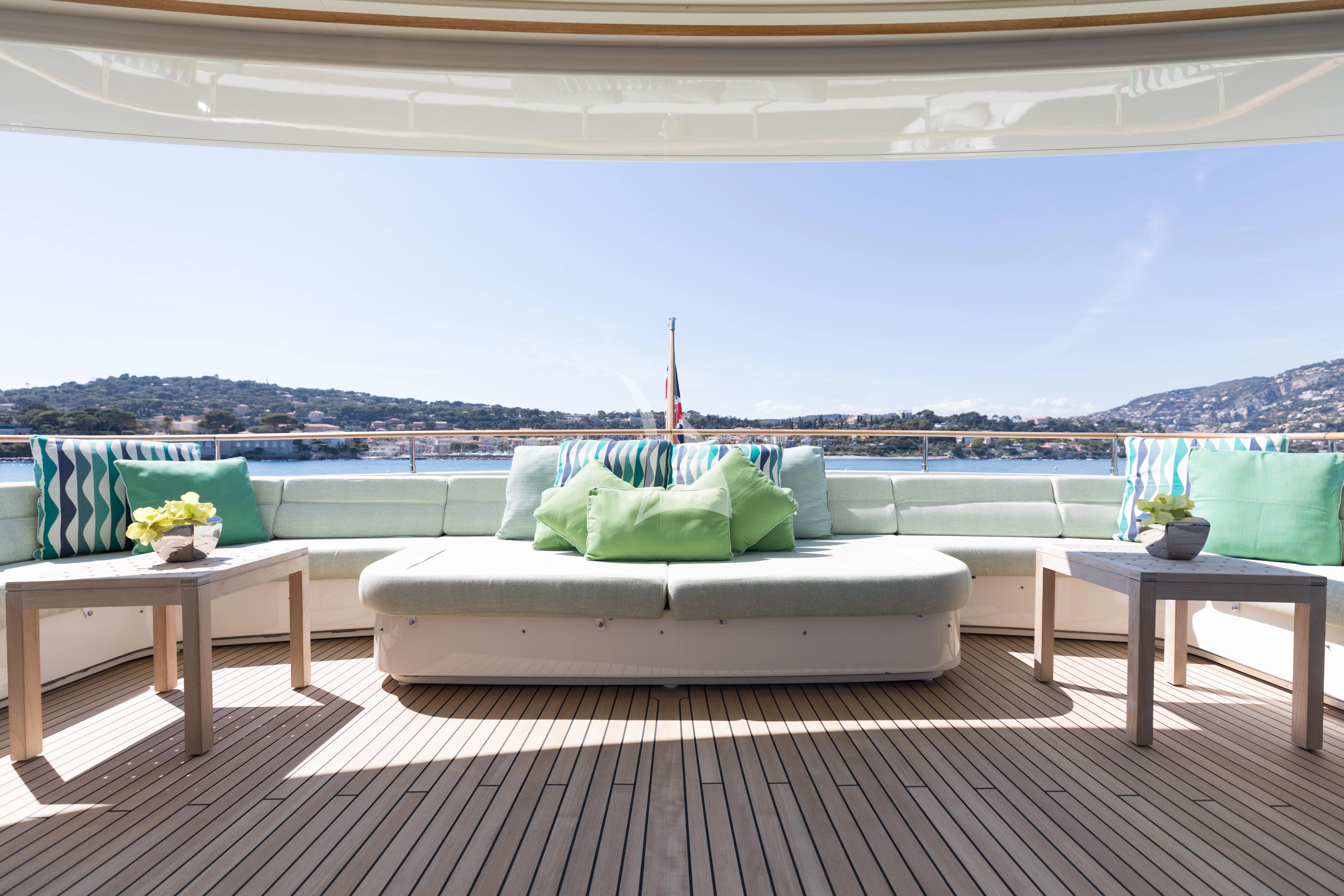 a couch in a room aboard HANA Yacht for Charter