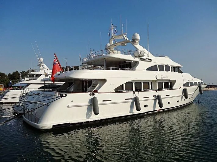 a large white boat in the water aboard OAK Yacht for Charter