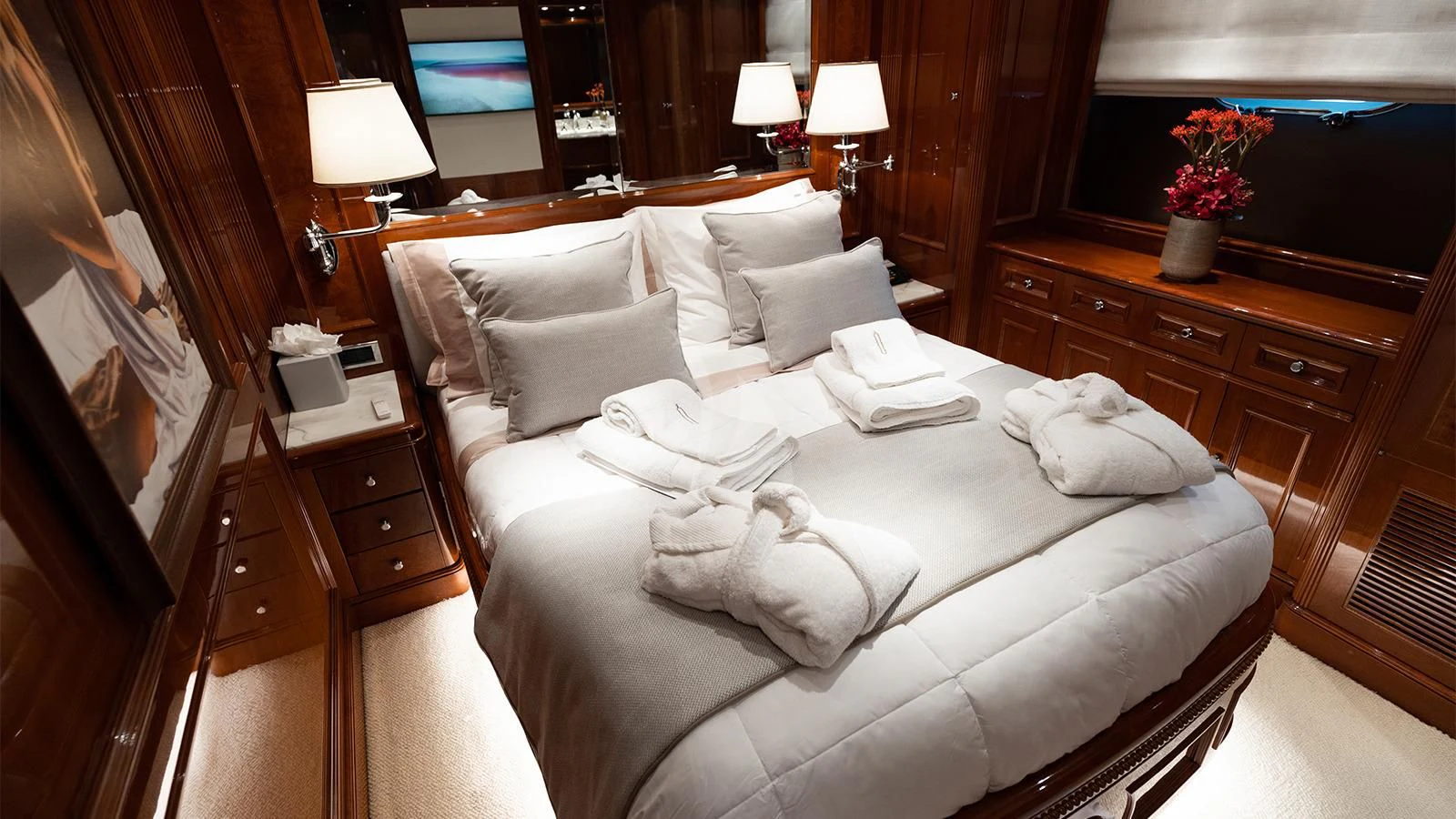 a bed with pillows and pillows aboard OAK Yacht for Charter