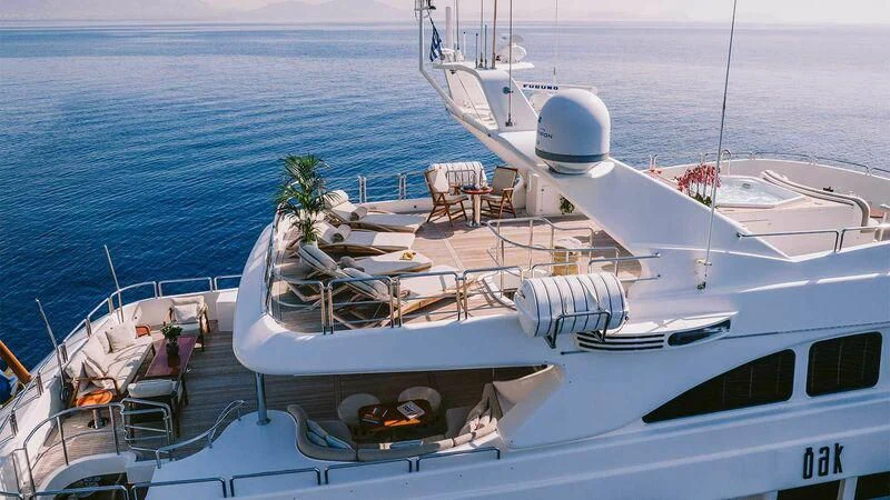 a boat docked at a pier aboard OAK Yacht for Charter