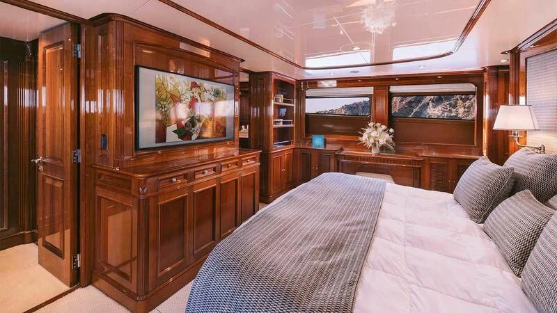 a bed in a room aboard OAK Yacht for Charter