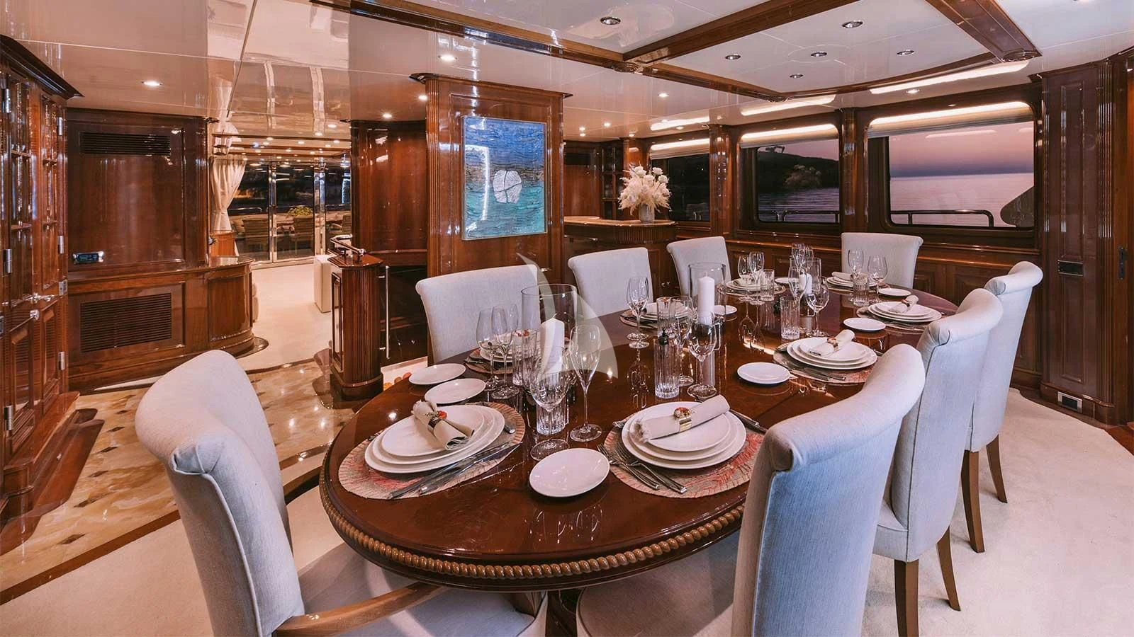 a table set for a dinner aboard OAK Yacht for Charter